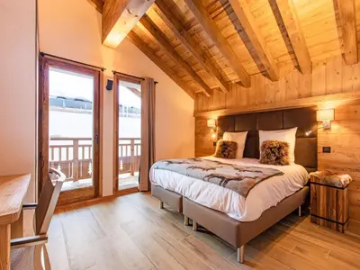 Un ou plusieurs lits dans un hébergement de l'établissement Chalet in Champagny by Ski Slopes