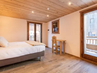 Un ou plusieurs lits dans un hébergement de l'établissement Chalet in Champagny by Ski Slopes