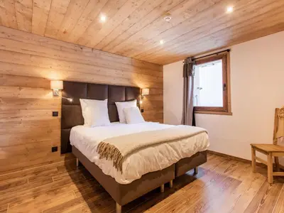 Un ou plusieurs lits dans un hébergement de l'établissement Chalet in Champagny by Ski Slopes