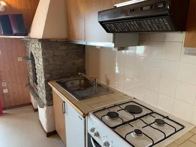 Cuisine ou kitchenette dans l'établissement Le p'tit coin montagne