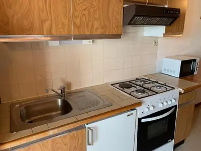 Cuisine ou kitchenette dans l'établissement Le p'tit coin montagne