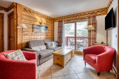Coin salon dans l'établissement Appartments in Tignes Ecrin des Neiges