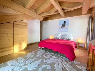 Un ou plusieurs lits dans un hébergement de l'établissement Chalet Kiriolé