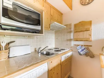 Cuisine ou kitchenette dans l'établissement Charmant 2 pièces 6 pers. aux Arcs 1800, proche pistes et commerces, animaux admis - FR-1-411-21