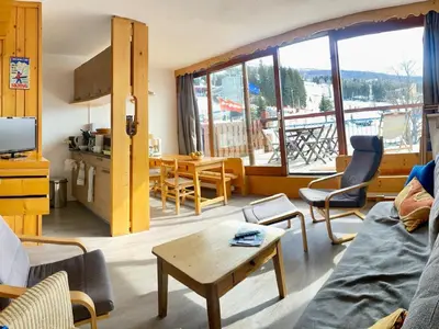 Coin salon dans l'établissement Appartement 3 pièces 7 personnes avec terrasse et Wifi, Les Arcs 1800, Villards - FR-1-411-395