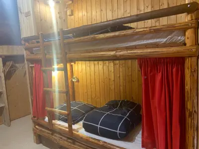 Un ou plusieurs lits superposés dans un hébergement de l'établissement Le p'tit coin montagne 2