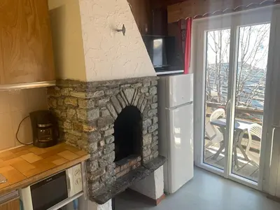 Cuisine ou kitchenette dans l'établissement Le p'tit coin montagne 2