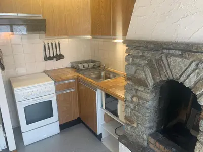Cuisine ou kitchenette dans l'établissement Le p'tit coin montagne 2