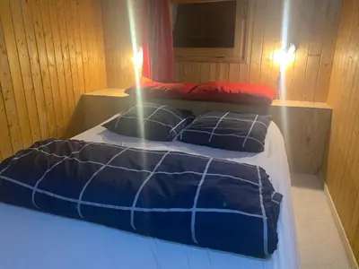 Un ou plusieurs lits dans un hébergement de l'établissement Le p'tit coin montagne 2