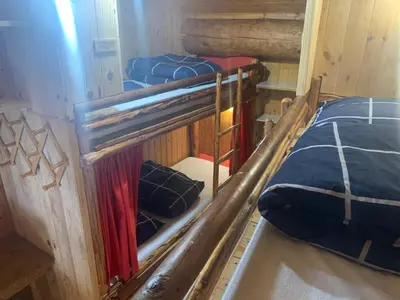 Un ou plusieurs lits dans un hébergement de l'établissement Le p'tit coin montagne 2