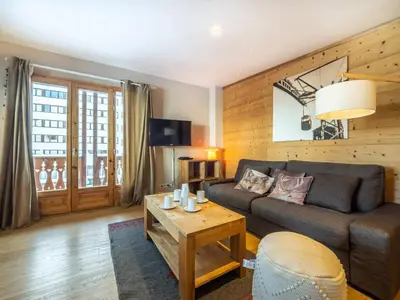 Coin salon dans l'établissement Appartement Tignes 6 pers, skis aux pieds, balcon, animaux acceptés - FR-1-502-479