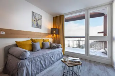 Coin salon dans l'établissement Appartement Arc 2000 Rénové 5 personnes Paradiski