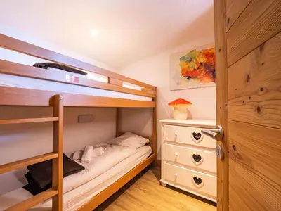 Un ou plusieurs lits dans un hébergement de l'établissement Chalet Millonex - Appartement rénové·skis aux pieds·WIFI·Balcon MAE-4984