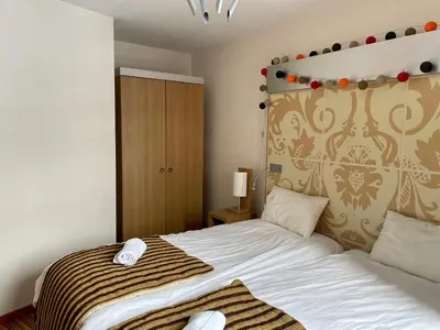 Un ou plusieurs lits dans un hébergement de l'établissement Edenarc Grand Duplex Familial 4 chambres, plein sud avec cheminée