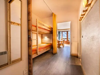 Un ou plusieurs lits dans un hébergement de l'établissement Résidence Bec Rouge - Appartement spacieux·Skis aux pieds·Balcon MAE-9464