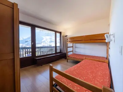 Un ou plusieurs lits dans un hébergement de l'établissement Résidence Bec Rouge - Appartement spacieux·Skis aux pieds·Balcon MAE-9474