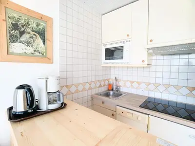 Cuisine ou kitchenette dans l'établissement Résidence Santon - Studio lumineux·Proche des pistes et des commerces MAE-9504