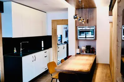 Cuisine ou kitchenette dans l'établissement Val Claret, Tignes Appt cosy 5-6pers Location dimanche dimanche en saison