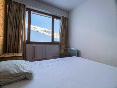 Un ou plusieurs lits dans un hébergement de l'établissement Résidence Bec Rouge - Appartement lumineux·Skis aux pieds·Balcon MAE-6744